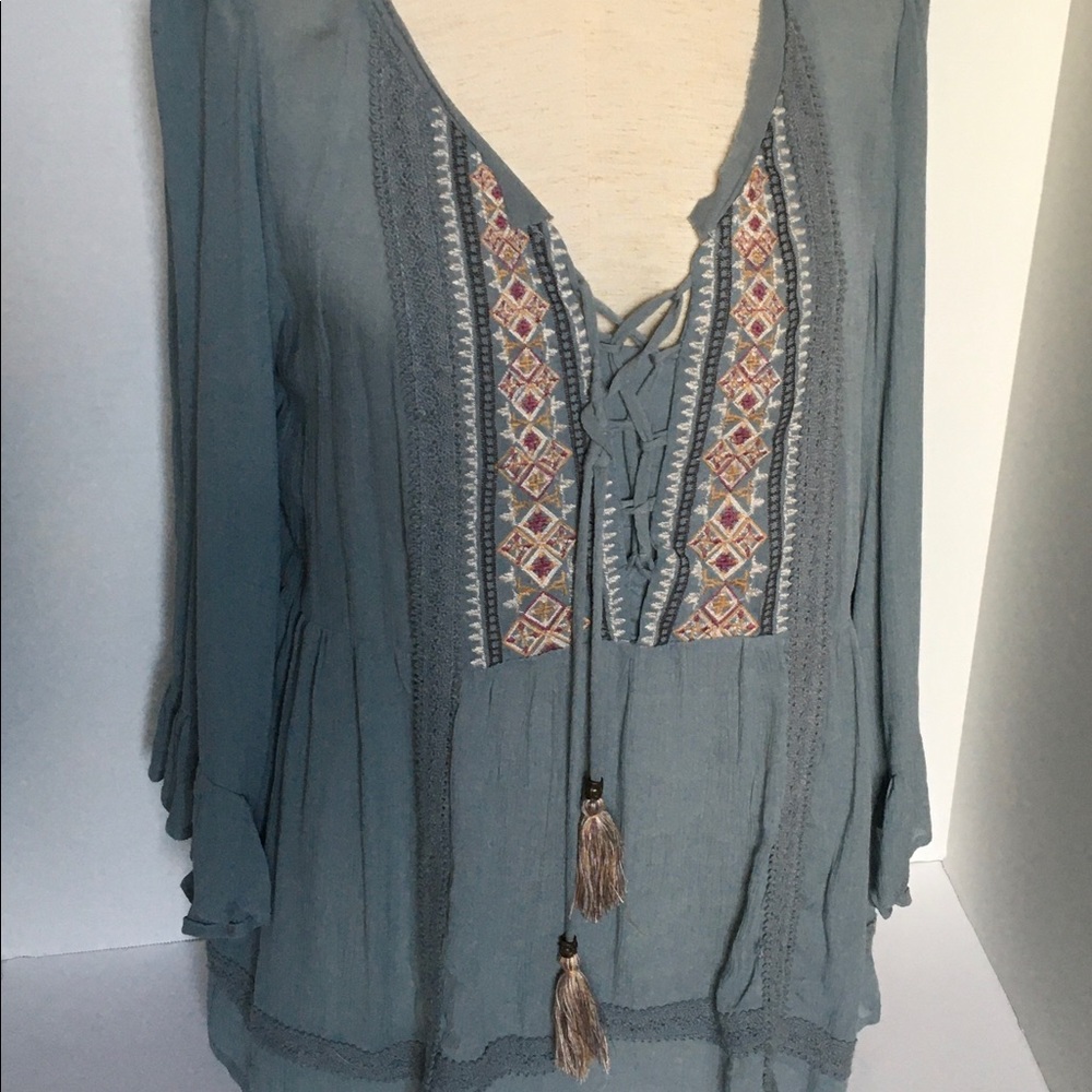 Weavers boho top with tassels.